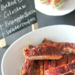 plate of ribs, cooked and cripsy on a table with spice rub, decorative