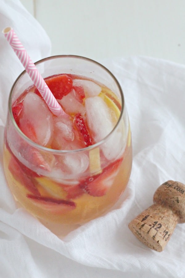 Peach and Strawberry Sparkling Sangria - the perfect cocktail for your spring, and summer soirees! | casadecrews.com
