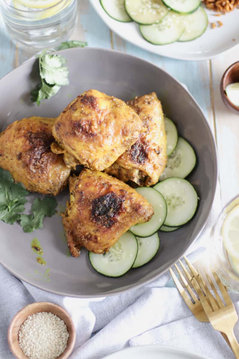 Juicy Chicken Thighs, tossed in a savory tumeric and ginger marinade, make for a batch of the crispiest, and most flavorful chicken thighs ever.