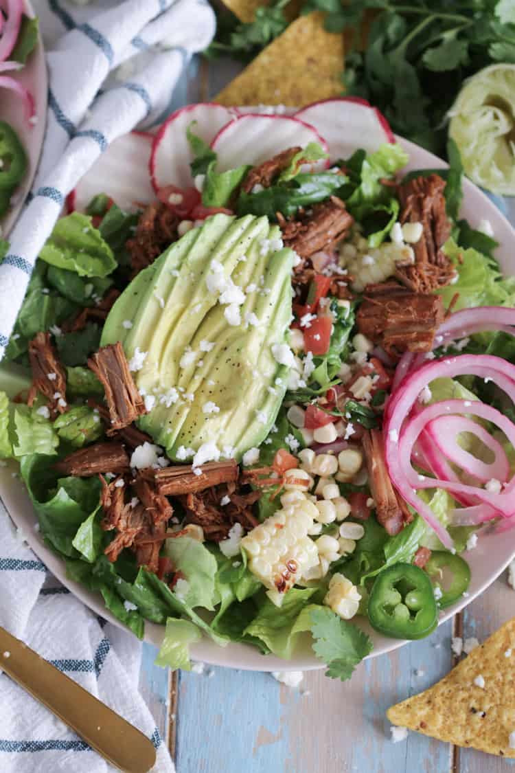 Shredded beef braised with a spicy blend of cumin, chipotle powder, garlic and oregano. This barbacoa is great protein for all of your Mexican inspired meals, made in your favorite pressure cooker!