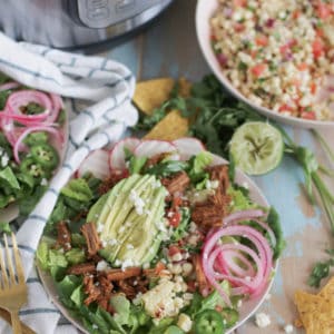 Shredded beef braised with a spicy blend of cumin, chipotle powder, garlic and oregano. This barbacoa is great protein for all of your Mexican inspired meals, made in your favorite pressure cooker!