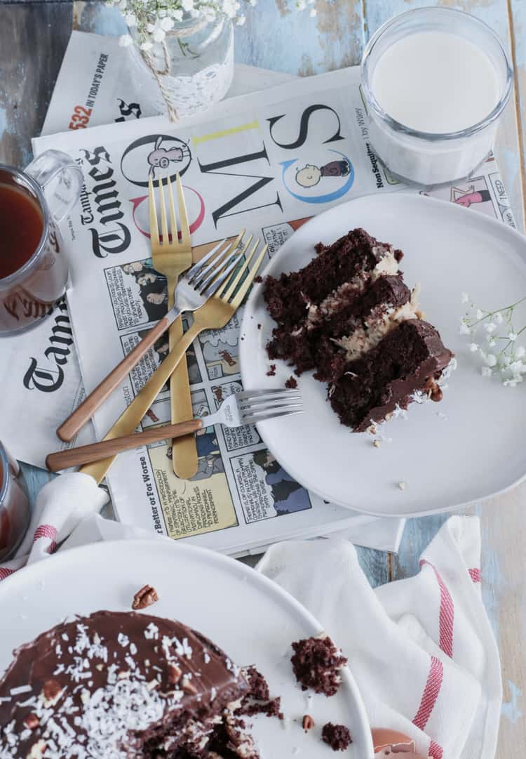 Boxed Chocolate Cake Mix, layered with homemade sweet coconut and pecan filling, give this classic cake a more modern look!