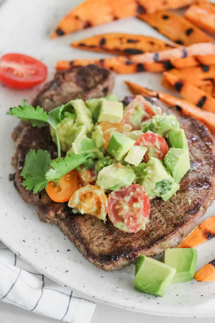 cumin rubbed sirloin steak with avocado salsa