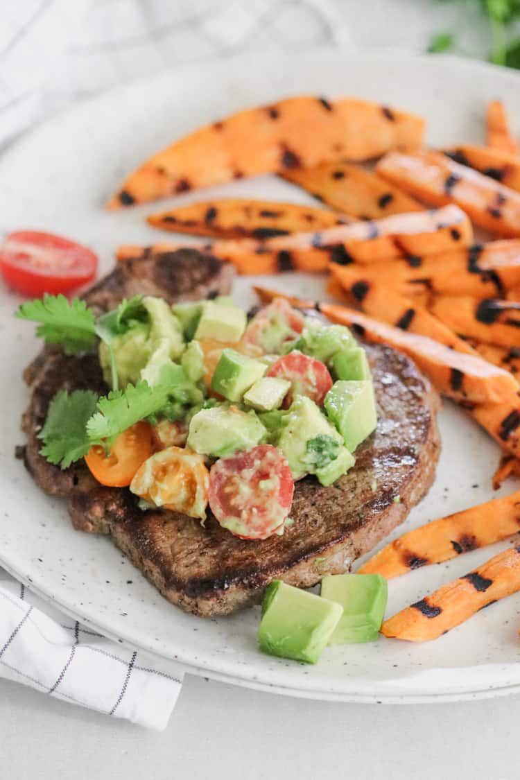 cumin rubbed sirloin steak with avocado salsa