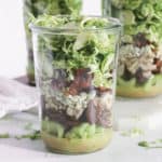 shredded brussels sprouts salad with bacon and dried figs