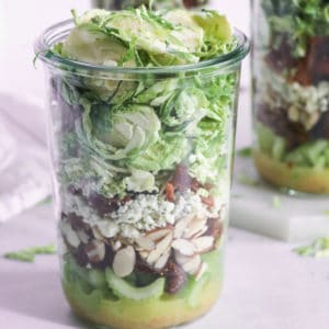 shredded brussels sprouts salad with bacon and dried figs