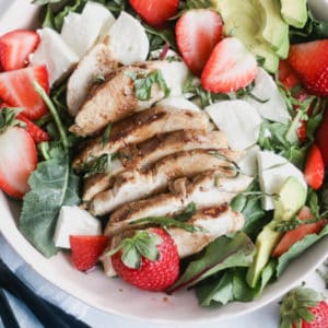strawberry caprese chicken salad with a maple balsamic vinaigrette